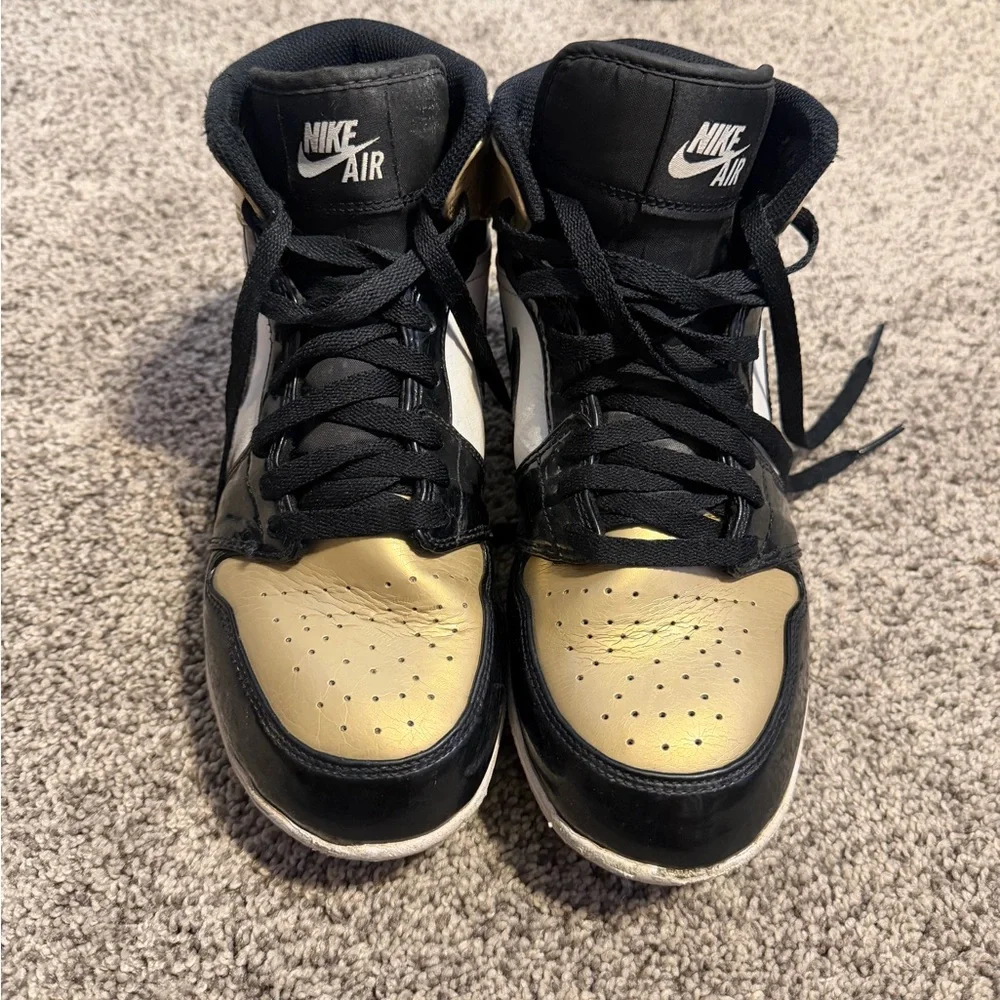 Nike Black and Gold High-Top Sneakers